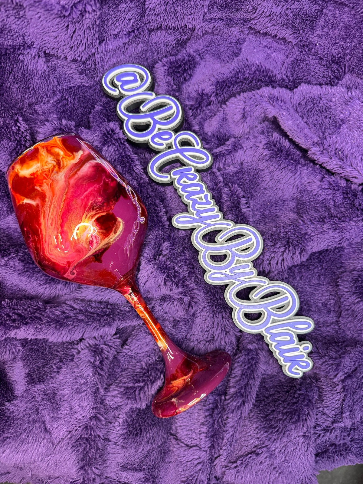 3.  Burgundy and Orange glass wine Glass